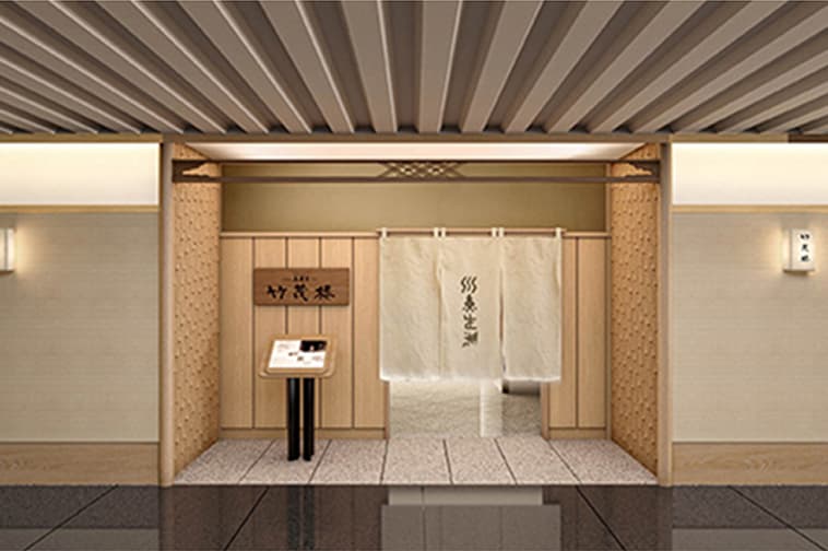 The interior of this Japanese-modern kaiseki restaurant features wooden lattices and subdued lighting.