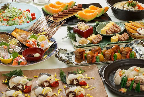 A set meal of Japanese kaiseki cuisine featuring one soup and three side dishes, with small bowls arranged around the table