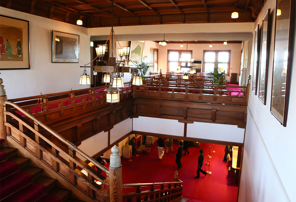 Photo: Grand staircase with red carpet