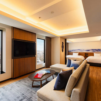 Photo: Rooms with sofa, TV and bed